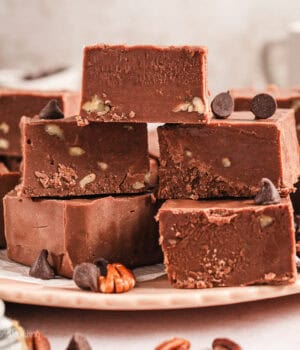 Fantasy fudge stacked on a white plate.