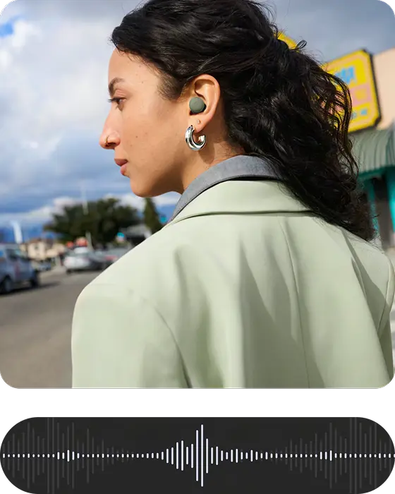 A person having a pleasant conversation while using their Pixel buds.