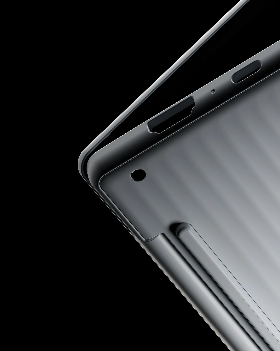 A close-up view of the metallic hinge and corner edge of a slightly open Lenovo Googlebook laptop.
