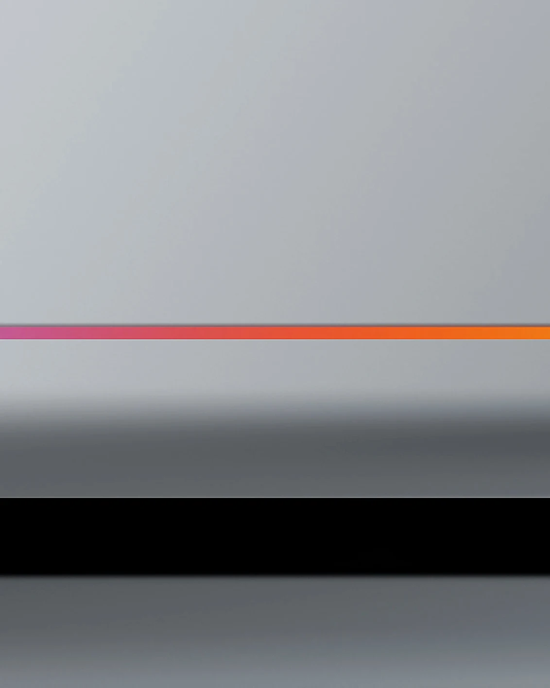 A closeup shot of the rainbow glow bar on the Lenovo Googlebook.