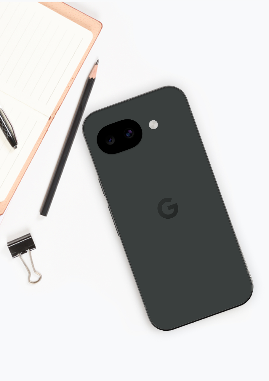 A Google Pixel 9a next to a pencil, notepad, and binder clip.