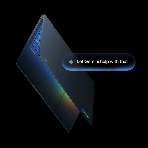 A partially open Acer laptop against a black background with a Gemini prompt overlay.
