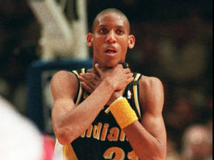 Basketball player gripping his throat during a game — NBA Wallpaper