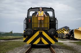 Rail Sidings Limited managing director Gary Draisey aboard shunting locomotive “Charlie” at the Eastriggs site